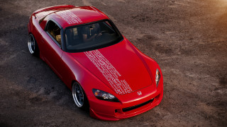 Red sportscar white stripe driver - a person in the driver seat free wallpaper