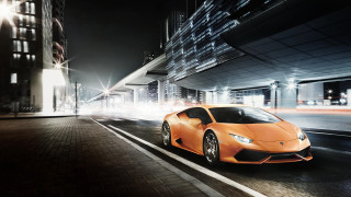 Orange sports car night cityscape - nice free wallpaper
