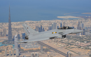 Fighter jet city river skyline - aerial free wallpaper