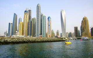 River cityscape ruins tower boat - bascove free wallpaper for desktop