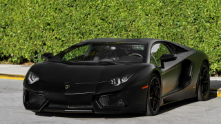 Black sports car parked 3d - a parking lot free wallpaper
