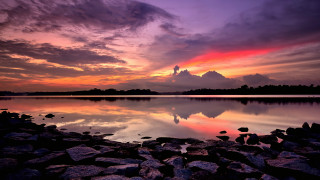 Sunset lake rocks water mountains - rock and water free wallpaper