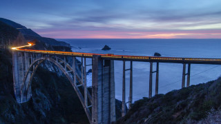 Train bridge ocean mountains dusk - dusk free wallpaper