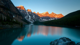 Mountain reflection sunset lake boat - a matte painting free wallpaper