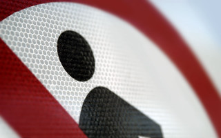 Red white sign black dots - a black dot free wallpaper