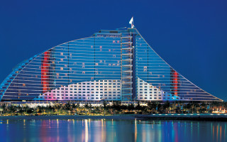 Tall building colorful design night - modernism free wallpaper