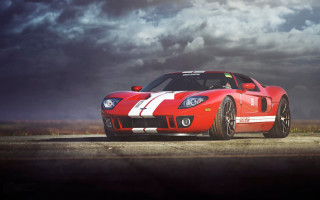 Red sports car cloudy sky 12 - f 8 aperture free wallpaper