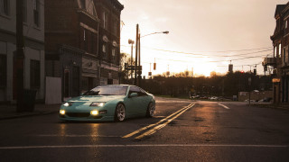 Pastel military car sunset street - a street light in the background free wallpaper