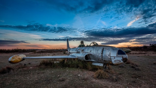 Plane drygrass cloudy sky person - under a cloudy sky free wallpaper