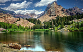 Mountain lake forest rocks sky 3 - a mountain lake free wallpaper