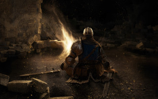 Medieval armor kneeling cave sword - his hand and a fire free wallpaper