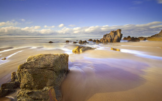 Rock sand beach blue sky 2 - the sand free wallpaper