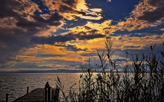 Sunset dock lake cityscape clouds - a sunset in the background free wallpaper