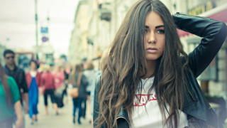Woman longhair streetcorner blurry photorealistic - a street corner free wallpaper