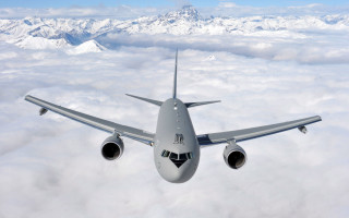 Large jetliner cloudy sky mountain - a large jetliner free wallpaper
