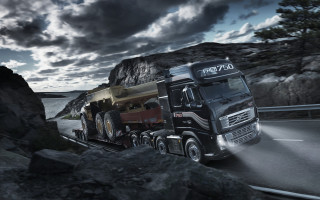 Truck mountain cloudy sky lightbeam - under a cloudy sky free wallpaper