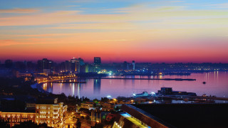 City skyline night water bridge 7 - a city in the foreground free wallpaper