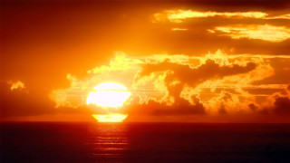 Sunset clouds boat bird horizon - cloud and a sun free wallpaper