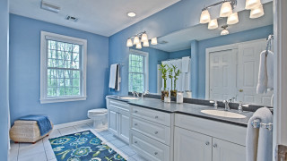 Blue wall white sink toilet - a bathroom free wallpaper