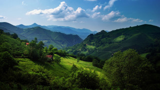Lush green hillside house mountains 3 - edi rama free wallpaper