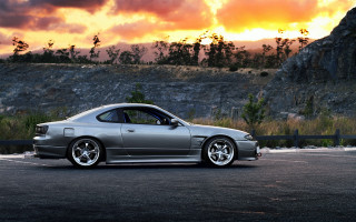 Silver car sunset clouds fineart - a silver car free wallpaper