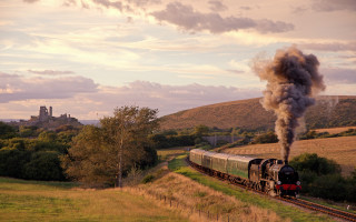 Train field castle smoke backlit - a train free wallpaper