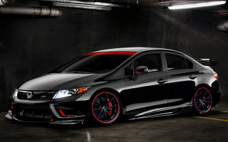 Black car red rims parking 2 - a black car free wallpaper