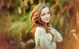 Woman blonde hair autumn field - long hair and a sweater free wallpaper