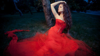 Woman red dress sitting forest - daphne mcclure free wallpaper