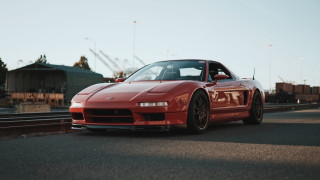Red sports car traintrack building - redshift free wallpaper