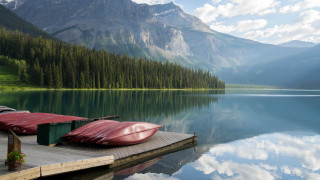 Dock canoes mountain lake clouds - anthony s waters free wallpaper