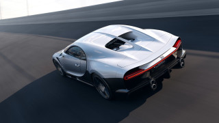 Silver sports car bridge building - a silver sports car free wallpaper for desktop