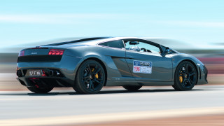 Silver sports car driving road 7 - a silver sports car free wallpaper for desktop