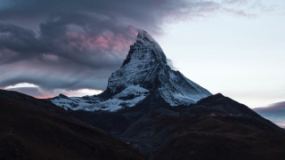 Mountain snow peak cloudy sky 4 - under a cloudy sky free wallpaper
