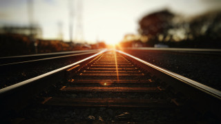Train track sunset trees building - a building in the background free wallpaper