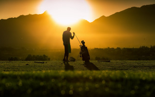 Golf playing man child sunset - dennis ashbaugh free wallpaper for desktop