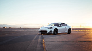 White sports car runway sunset - the horizon behind free wallpaper