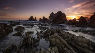 Sunset ocean rocks water figure - the rock free wallpaper