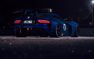 Blue sports car parking lot 20 - a parking lot free wallpaper