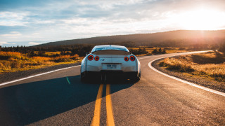 White sports car country road 2 - the sun free wallpaper