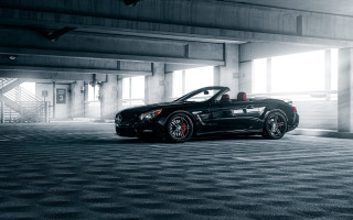 Black sports car parking garage 7 - a sun free wallpaper