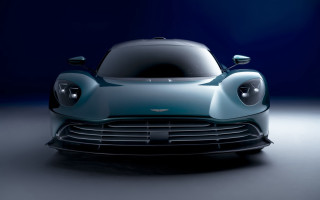 Blue car dark room spotlight 2 - a spotlight free wallpaper