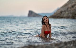 Woman red bikini water rocks - kitsch movement free wallpaper