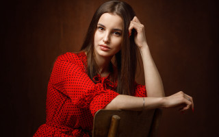 Woman red dress chair portrait - a red dress free wallpaper for desktop