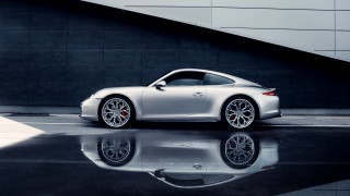 Silver sports car reflection pavement - a reflection free wallpaper