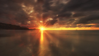 Sunset water boat mountain clouds 3 - crepuscular ray free wallpaper