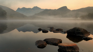 Lake rocks mountains fog sunset - fog in the air free wallpaper