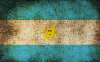 Grungy flag sun face center - a grungy flag free wallpaper