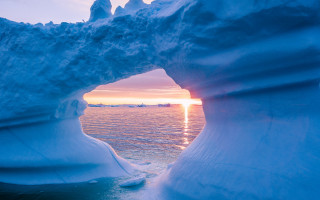 Large iceberg hole sunset ecological - ice free wallpaper