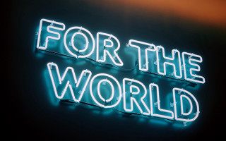 Neon sign international typographic woman - side of a wall free wallpaper